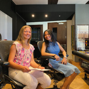 Nani working on vocals in the control room of a recording studio